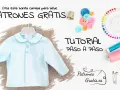 Camisa de bebé azul colgada, con botones y accesorios de costura. ¡Descarga patrones gratis de bebé para imprimir y crea esta prenda!