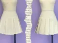 Falda beige con pliegues, una **técnica de costura que forma pliegues en la tela** para un estilo clásico.