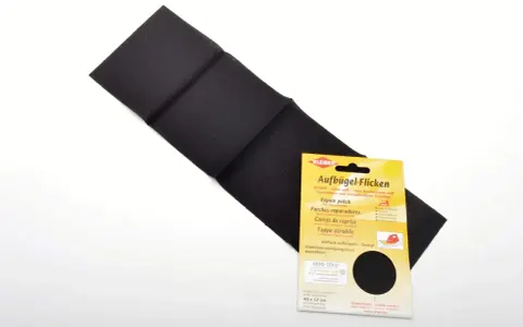 Parche negro para reparar textiles, ideal para saber como pegar un parche con plancha. Fácil de usar y duradero.