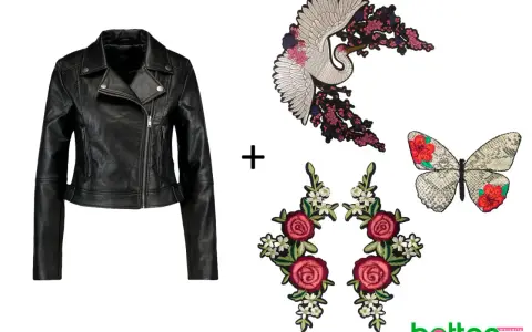 Chaqueta de cuero negra lista para customizar con parches de grulla, mariposa y rosas.