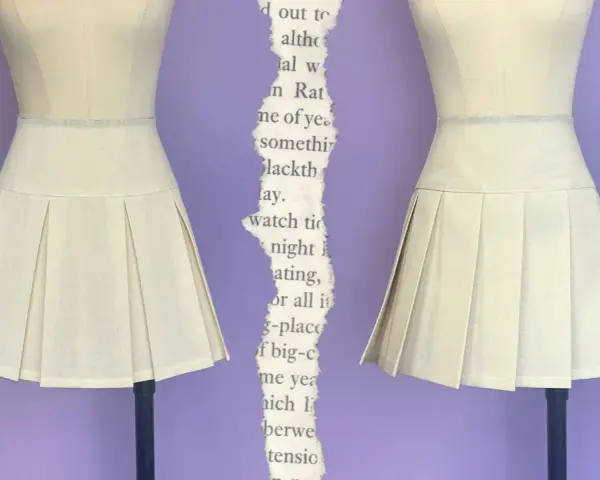 Falda beige con pliegues, una **técnica de costura que forma pliegues en la tela** para un estilo clásico.