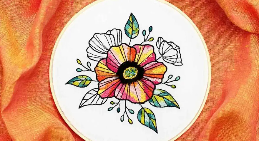 Hermoso bordado de flores coloridas y hojas, ideal como patrones de flores para bordar e imprimir.