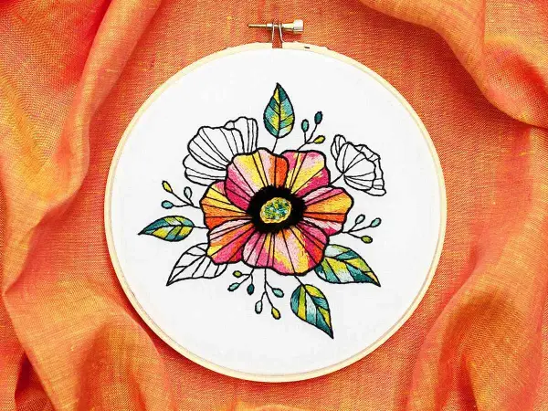 Hermoso bordado de flores coloridas y hojas, ideal como patrones de flores para bordar e imprimir.